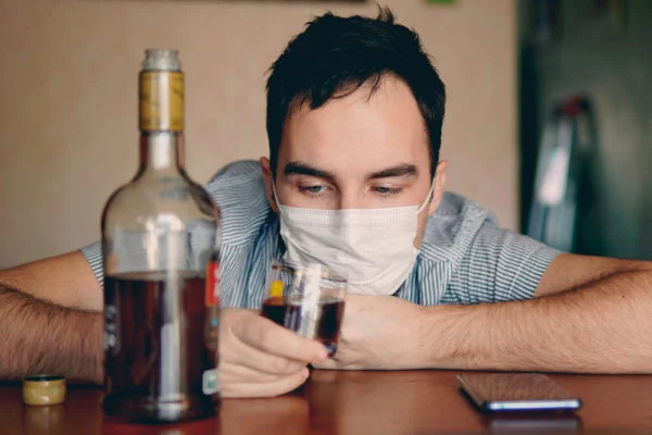 Does drinking alcohol or being an alcoholic affect COVID?